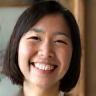Happy workshop attendee Yumi K. smiling warmly